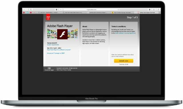 MacBook på nedladdningssidan för Adobe Flash Player.