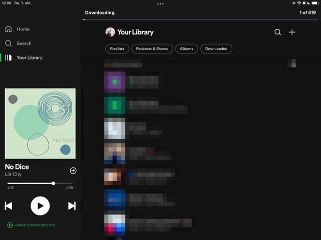 Ekrānuzņēmums, kurā redzama lejupielādes josla vietnē Spotify darbam ar iPad