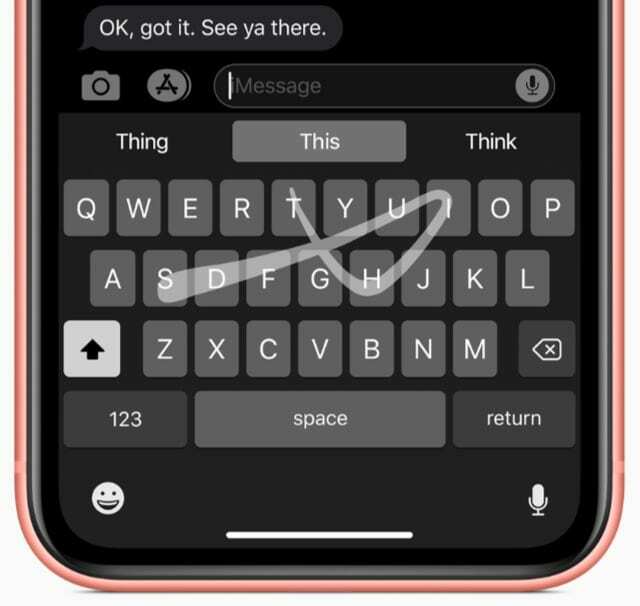 Klávesnice QuickPath systému iOS 13 na iPhonu v tmavém režimu