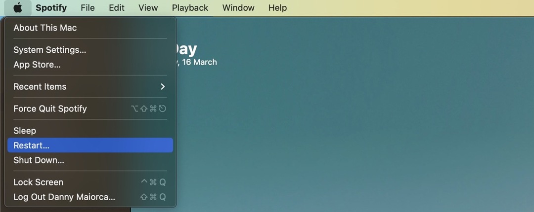 Zrzut ekranu z monitem o ponowne uruchomienie komputera Mac