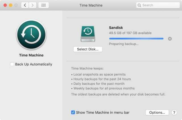 Time Machine se prepara para hacer una copia de seguridad de la ventana de Preferencias del Sistema.