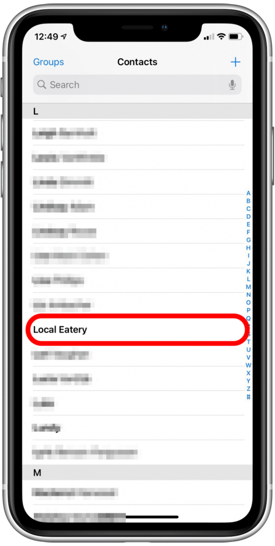 Aggiungi un'estensione al numero di telefono di un contatto nell'app Contatti.