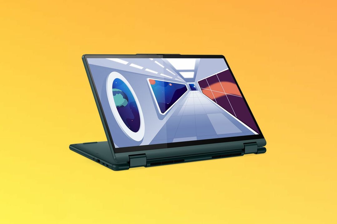 Vista frontal angular do Lenovo Yoga 6 no modo stand e ligeiramente voltada para a direita. O laptop está colocado sobre um fundo gradiente amarelo e laranja.