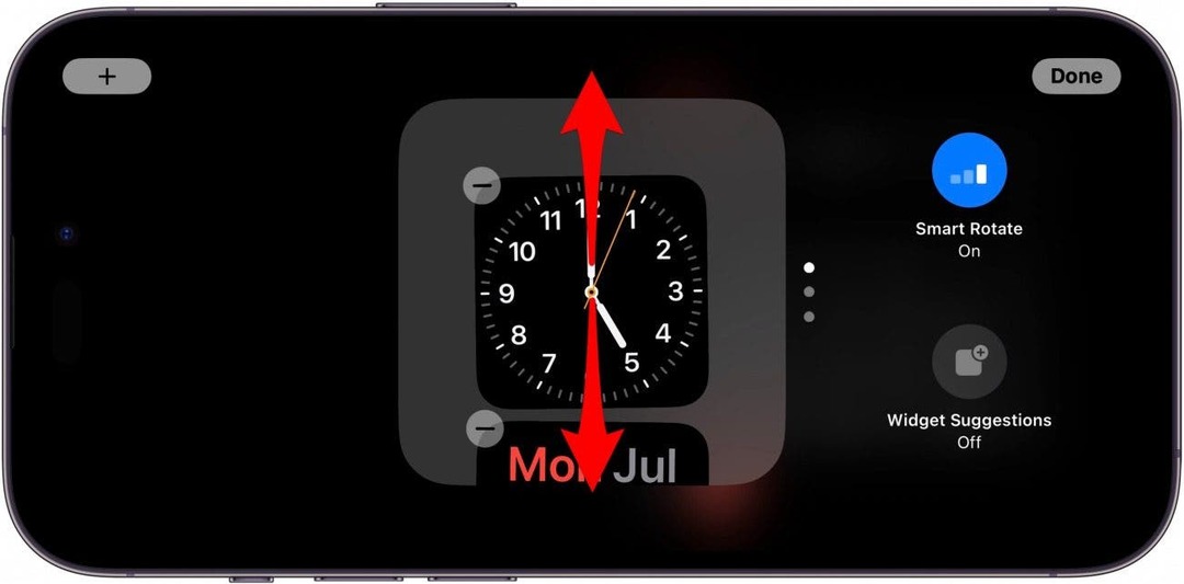 tela de widgets em espera do iphone com setas vermelhas apontando para cima e para baixo na pilha de widgets, indicando para deslizar para cima ou para baixo