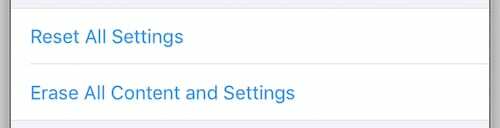 Az összes tartalom és beállítás törlése opció az iOS rendszerben.