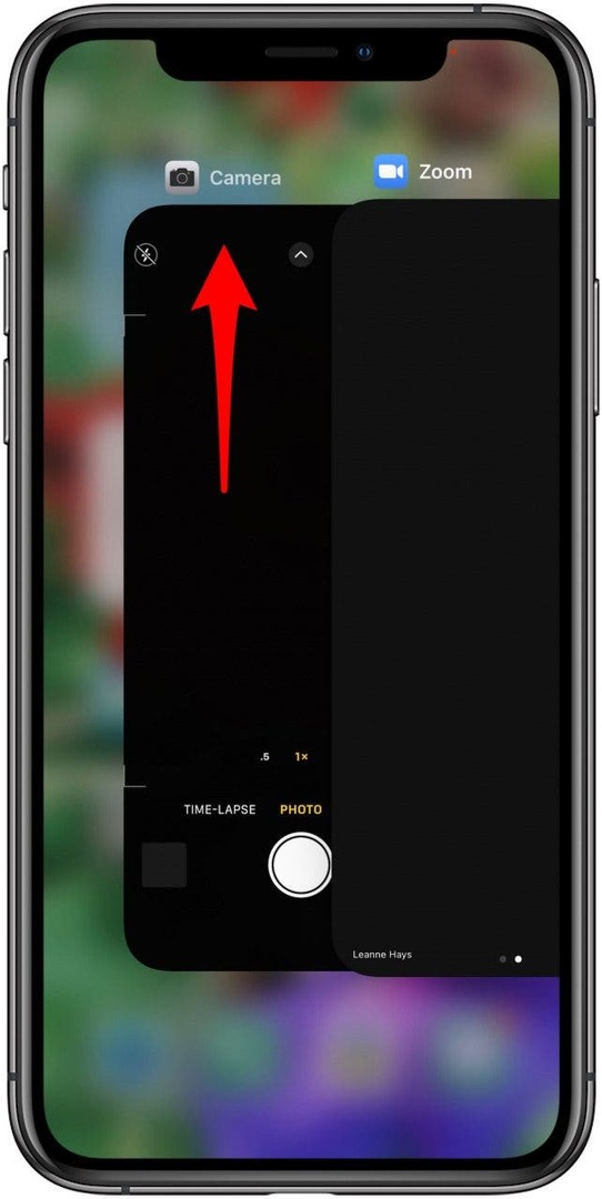 braukite aukštyn, kad išeitumėte iš kamerą naudojančių programų