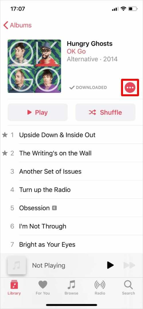 Apple Music albums, izceļot trīs punktus