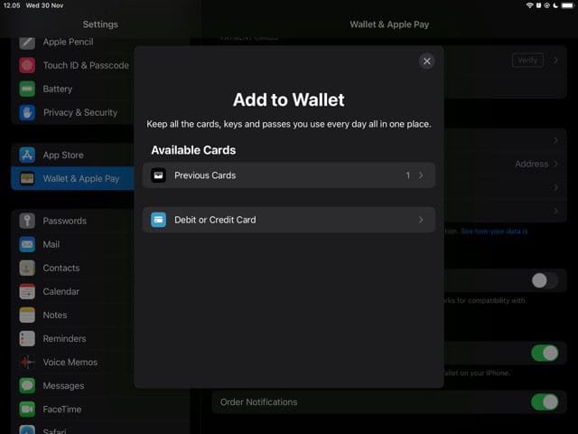 ภาพหน้าจอแสดงวิธีเพิ่มบัตรเดบิตหรือบัตรเครดิตบน iPad