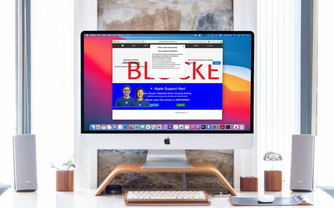 Alerta de virus pornográfico en un iMac.