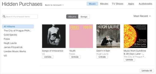 Paslėpti pirkiniai iTunes paskyroje su mygtuku Neslėpti