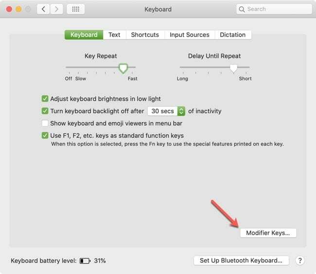 Noklikšķiniet uz Modifier Keys Mac