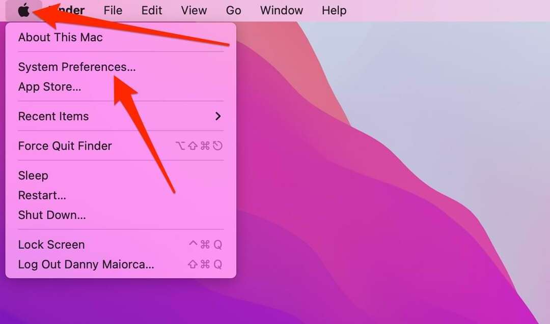 Cuplikan layar menampilkan logo Apple dan opsi System Preferences