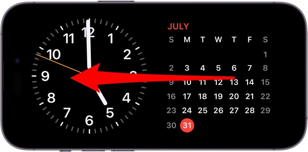 tela de espera do iphone com widgets de relógio e calendário e uma seta vermelha apontando para a esquerda na tela, indicando que você deve deslizar para a esquerda na tela