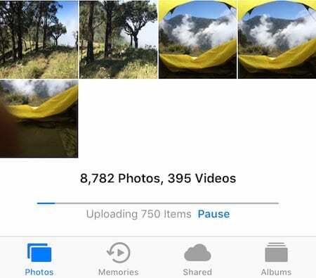 Skærmbillede af appen Fotos i færd med at uploade 750 elementer